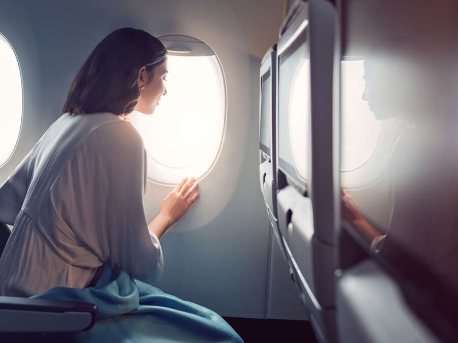 20220903_ETIHAD_SH05_MEDITARRANEAN COUPLE_SLEEPING_ECONAMY HEAD REST_00872_v1 copy 2