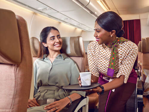 20230414_ETIHAD_A380_SHOT-2_INDIAN FAMILY_CREW SERVING DRINKS_00193_v1 copy