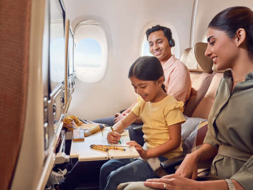 20230414_ETIHAD_A380_SHOT-3_INDIAN FAMILY_CREW HANDING ACTIVITY PACKS_00246_final_v1 copy