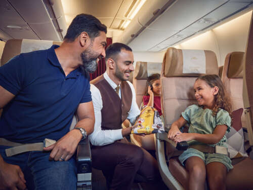 20230414_ETIHAD_A380_SHOT-3_MIXED RACE FAMILY_CREW HANDING ACTIVITY PACKS_00640_final_v1 copy