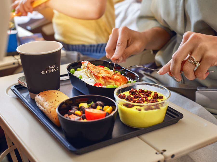 20230414_ETIHAD_A380_SHOT-4_INDIAN FAMILY_GUEST EATING MEAL_00483_v1 copy