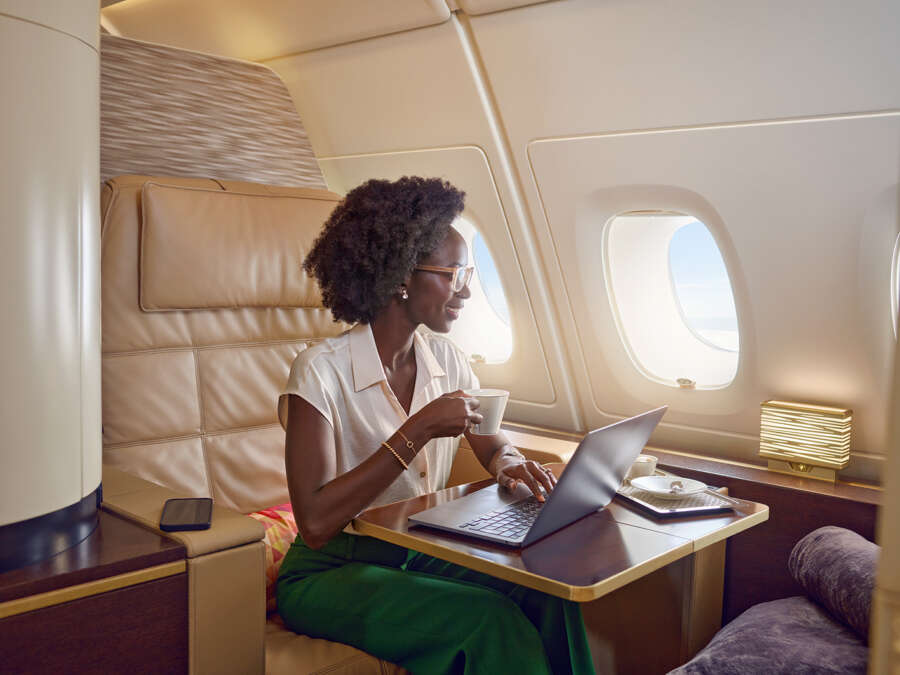 20230415_ETIHAD_A380_SHOT-3_FIRST CLASS_SINGLE FEMALE_GUEST WORKING IPAD_00362_final_v2 copy