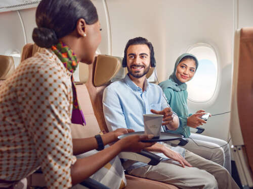 20230417_ETIHAD_A380_ECONOMY_GCC COUPLE_CREW SERVING DRINKS_00481_v1 copy