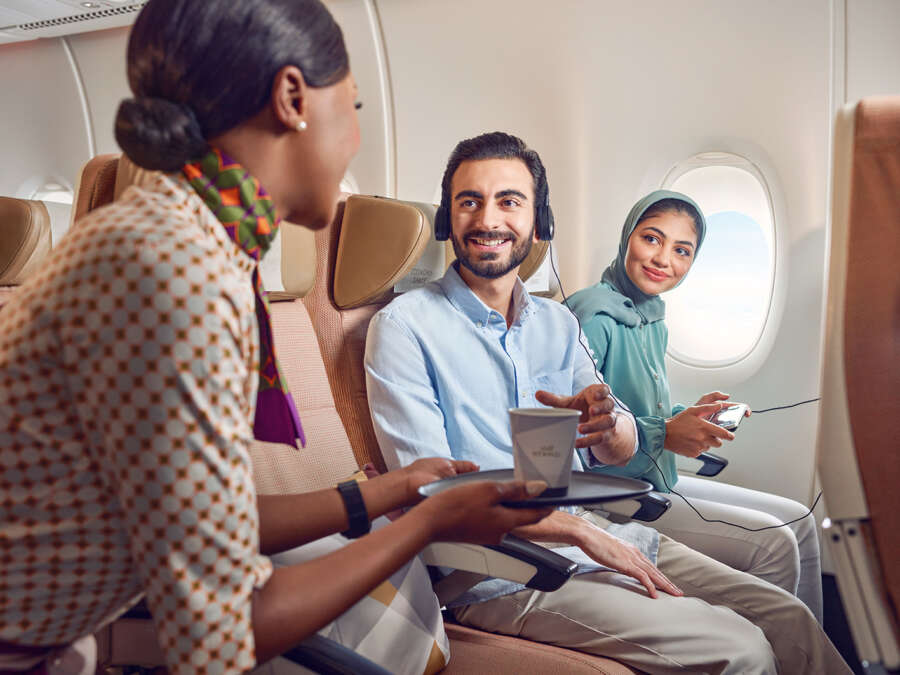 20230417_ETIHAD_A380_ECONOMY_GCC COUPLE_CREW SERVING DRINKS_00481_v1 copy