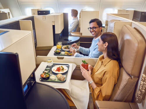 20230418_ETIHAD_A380_BUSSINESS_INDIAN COUPLE_GUEST EATING MEAL_00500_v1 copy